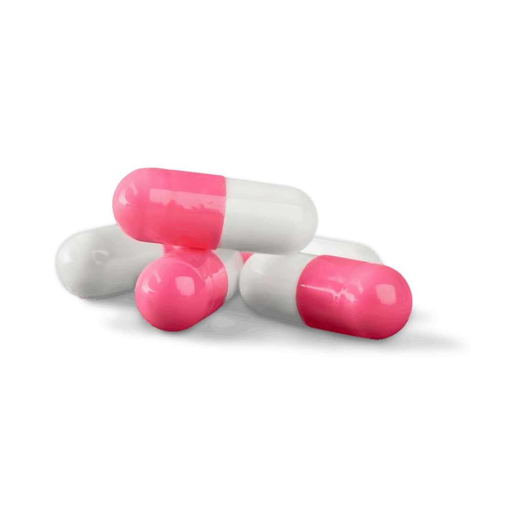 pink and white pill capsules